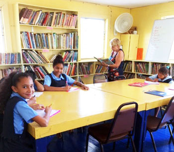 Children Studying Childrens Library Placencia