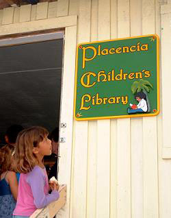 childrens library sign placenciia belize